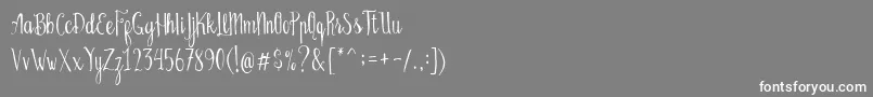 Bellanie Script Free Demo-fontti – valkoiset fontit harmaalla taustalla