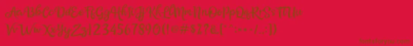 Bellasya Font – Brown Fonts on Red Background