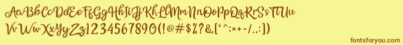 Bellasya Font – Brown Fonts on Yellow Background
