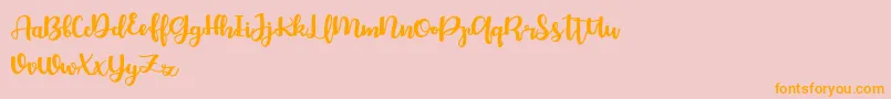 Bellco FREE-Schriftart – Orangefarbene Schriften auf rosa Hintergrund