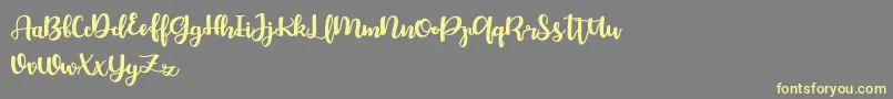 Bellco FREE Font – Yellow Fonts on Gray Background