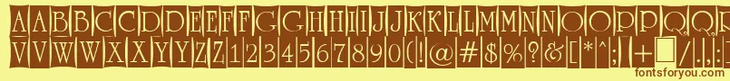 フォントARomanusttlcmd4cb – 茶色の文字が黄色の背景にあります。