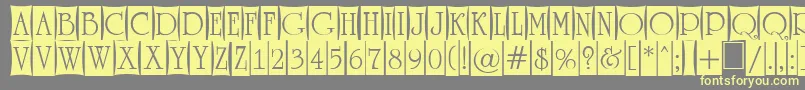 ARomanusttlcmd4cb Font – Yellow Fonts on Gray Background