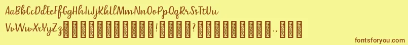 Fonte Belle Helene DEMO Script – fontes marrons em um fundo amarelo