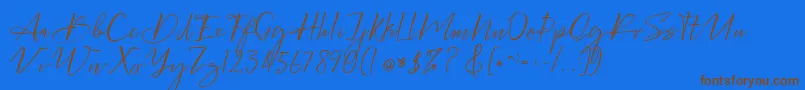 Bellgonate Font – Brown Fonts on Blue Background