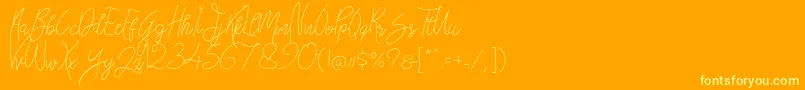 Шрифт Bellievia Script – жёлтые шрифты на оранжевом фоне