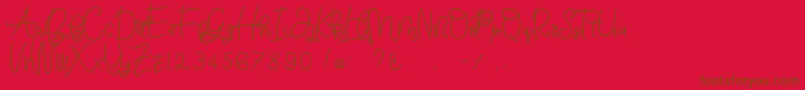 Fonte Bellinda Script – fontes marrons em um fundo vermelho