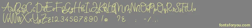 Bellinda Script-Schriftart – Gelbe Schriften auf grauem Hintergrund