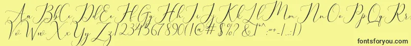 bellisa Font – Black Fonts on Yellow Background