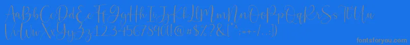 Belly Betty-Schriftart – Graue Schriften auf blauem Hintergrund