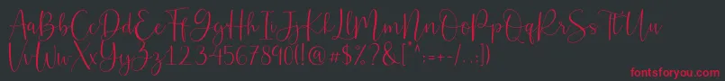 Belly Betty-Schriftart – Rote Schriften auf schwarzem Hintergrund