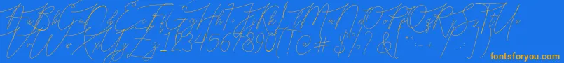 Bellya Vaky Font – Orange Fonts on Blue Background