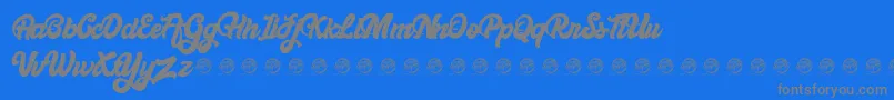 Bellynice Demo-fontti – harmaat kirjasimet sinisellä taustalla