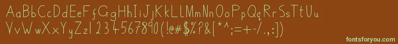 フォントBelmulletFont – 緑色の文字が茶色の背景にあります。