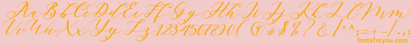 フォントBeloved Script – オレンジの文字がピンクの背景にあります。
