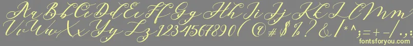 Beloved Script-Schriftart – Gelbe Schriften auf grauem Hintergrund