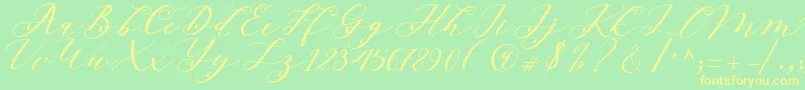 Beloved Script Font – Yellow Fonts on Green Background