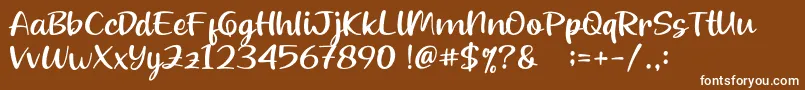 Beloved Teacher-Schriftart – Weiße Schriften auf braunem Hintergrund
