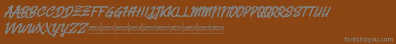 Belvanademo-fontti – harmaat kirjasimet ruskealla taustalla