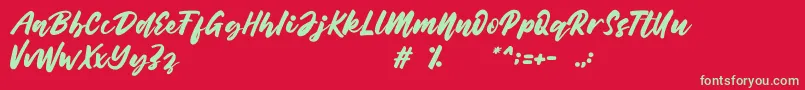 Belynda Font – Green Fonts on Red Background