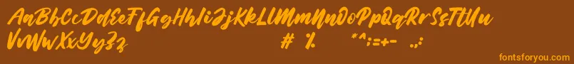Belynda Font – Orange Fonts on Brown Background