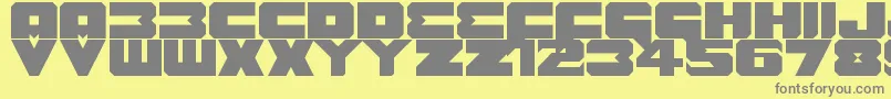 フォントBenny Benasi Font Remake – 黄色の背景に灰色の文字