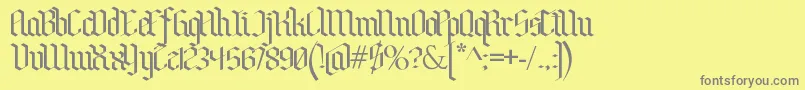 BenschGothic-fontti – harmaat kirjasimet keltaisella taustalla