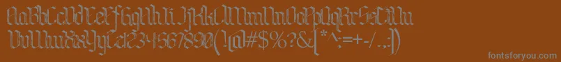 BenschGothicFlames Font – Gray Fonts on Brown Background