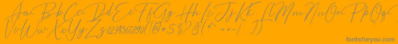 Bentosa-Schriftart – Graue Schriften auf orangefarbenem Hintergrund