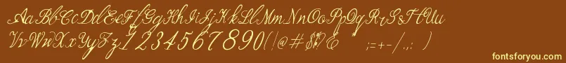 Bernadine Script Italic-Schriftart – Gelbe Schriften auf braunem Hintergrund