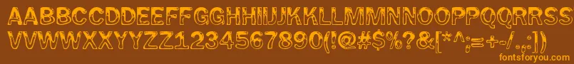 フォントWetpetRegular – オレンジ色の文字が茶色の背景にあります。