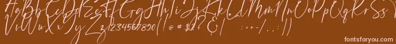 Bernaillo-Schriftart – Rosa Schriften auf braunem Hintergrund