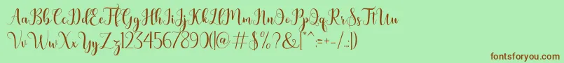 bertilda-Schriftart – Braune Schriften auf grünem Hintergrund