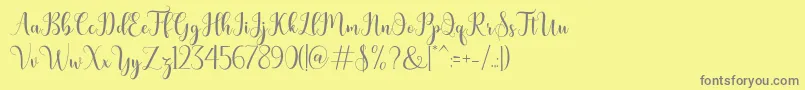 bertilda-Schriftart – Graue Schriften auf gelbem Hintergrund