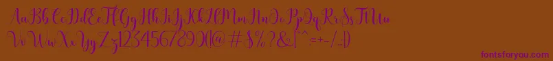 bertilda-Schriftart – Violette Schriften auf braunem Hintergrund