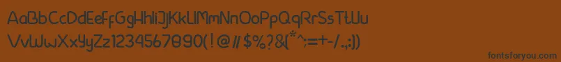 フォントbeside – 黒い文字が茶色の背景にあります