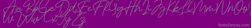 Bessita Handwriting Free Font – Gray Fonts on Purple Background