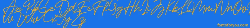 Fonte Bessita Handwriting Free – fontes laranjas em um fundo azul