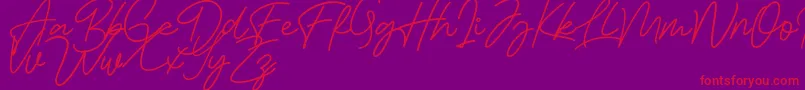 Bessita Handwriting Free-Schriftart – Rote Schriften auf violettem Hintergrund