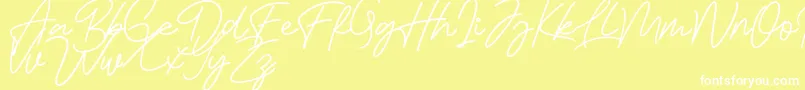 Bessita Handwriting Free Font – White Fonts on Yellow Background