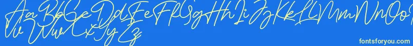 Bessita Handwriting Free-Schriftart – Gelbe Schriften auf blauem Hintergrund