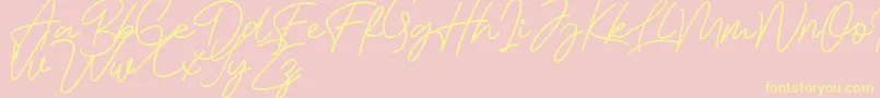 Bessita Handwriting Free Font – Yellow Fonts on Pink Background