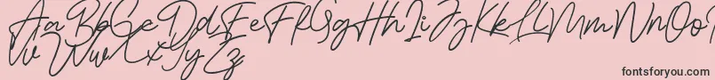 Bessita Handwriting Free-Schriftart – Schwarze Schriften auf rosa Hintergrund
