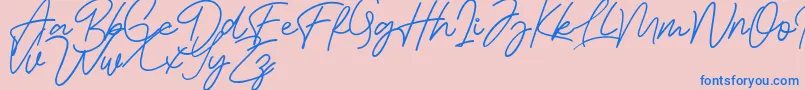 Fonte Bessita Handwriting Free – fontes azuis em um fundo rosa
