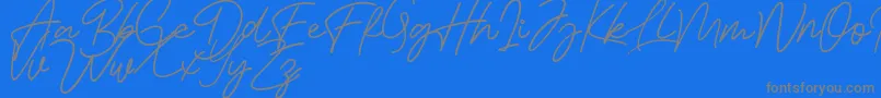 Bessita Handwriting Free-Schriftart – Graue Schriften auf blauem Hintergrund