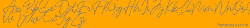 Bessita Handwriting Free-Schriftart – Graue Schriften auf orangefarbenem Hintergrund
