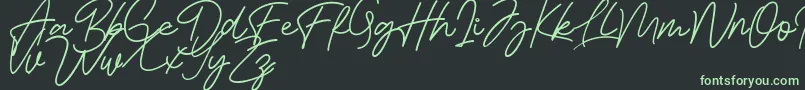 Bessita Handwriting Free Font – Green Fonts on Black Background