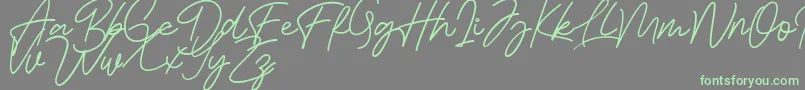 Шрифт Bessita Handwriting Free – зелёные шрифты на сером фоне