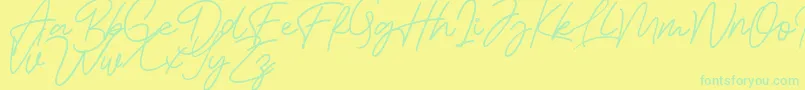Bessita Handwriting Free Font – Green Fonts on Yellow Background