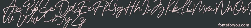 Шрифт Bessita Handwriting Free – розовые шрифты на чёрном фоне